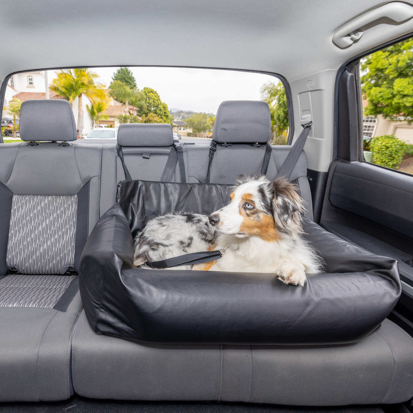 PupProtector™ Faux Cool-to-Touch Vegan Leather Memory Foam Dog Car Bed - Black Travel Paw.com
